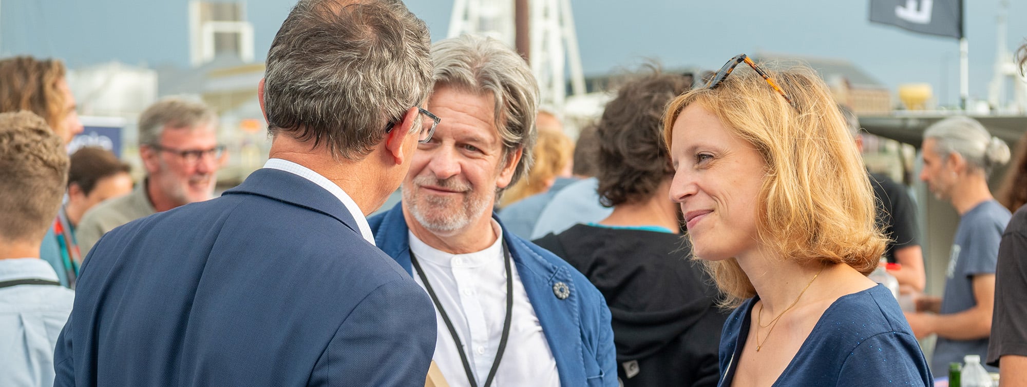 Group talking at the port of Saint-Malo
