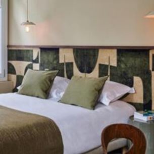 Bright Cartier hotel room with modern decor in Saint Malo